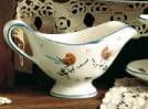 Salsiera artigianale con manico in ceramica - Dimensioni: 7,8 × 8,9 cm h 10,9 cm - Made in Italy.