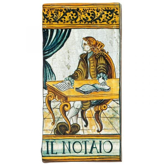Piastrella in ceramica raffigurante la professione di notaio Dimensioni: 9,9 x 19,8 cm. Made in Italy.