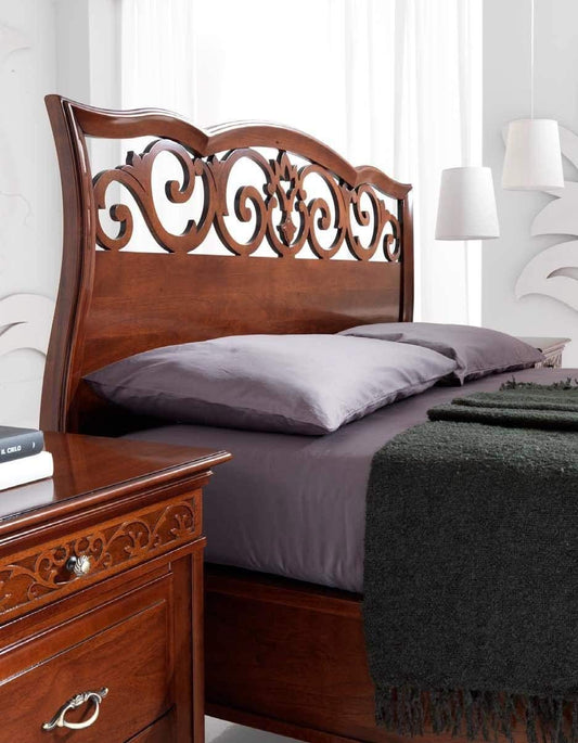 Dafne Italian Design Letto matrimoniale traforato legno scuro, H.136 X P.220 X L.90 - rete 180X200Testiera e pediera in legno massiccio di noce scuro.