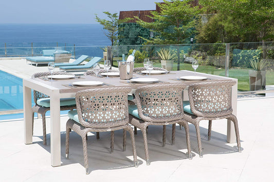 Dafne Italian Design Set pranzo 6 posti da esterno: 6 Sedie c/braccioli 63cm-H81cm-57m, c/cuscino antimacchia, struttura in rattan;e tavolo rett. 100cm-H75cm-200cm